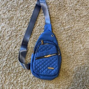 Quilted Blue Crossbody Sling Bag with Gold Hardware never used.